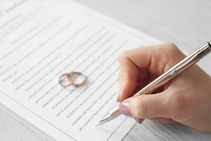 Miami family law attorney reviewing a marriage agreement